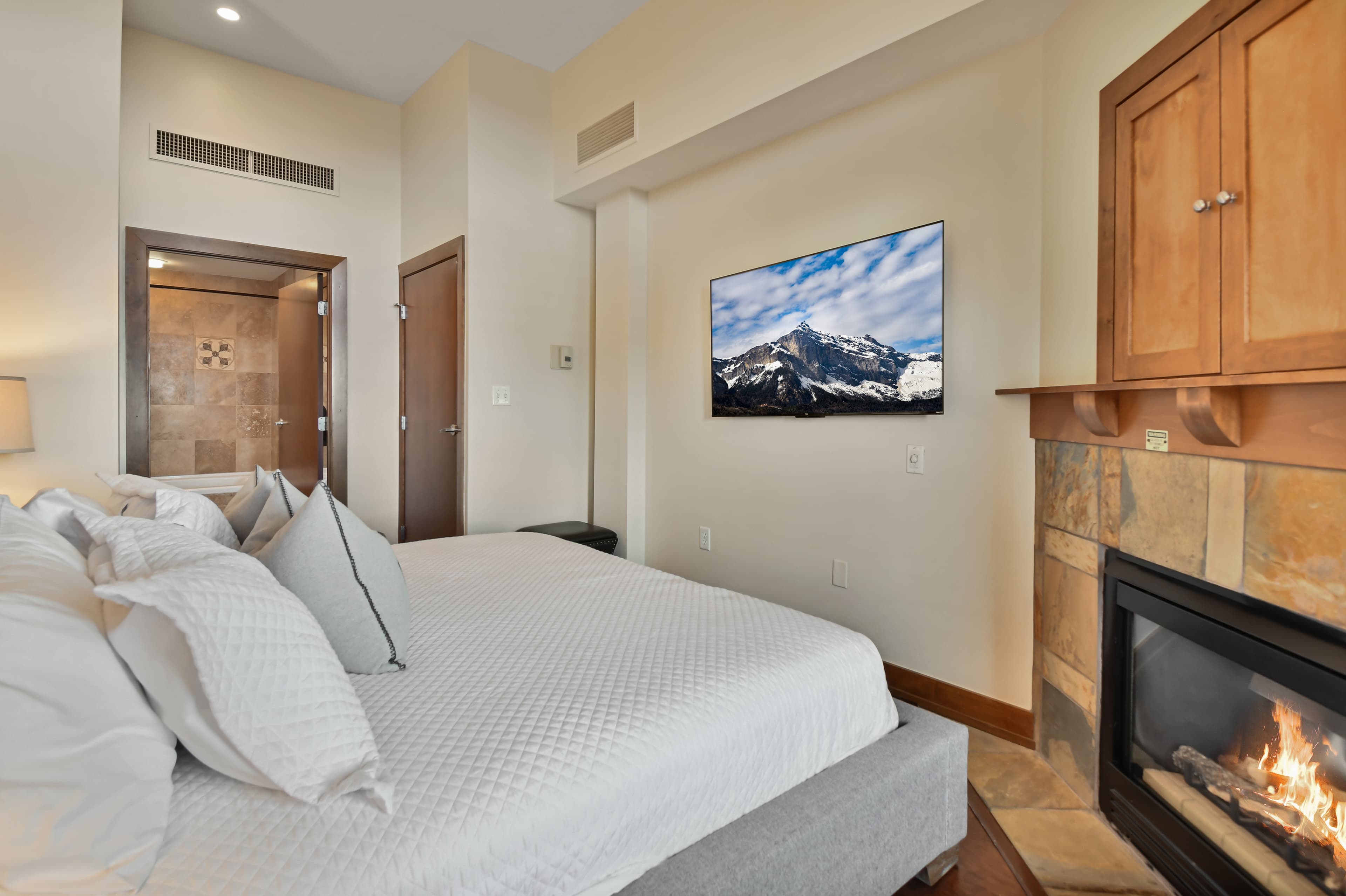 King bed and fireplace