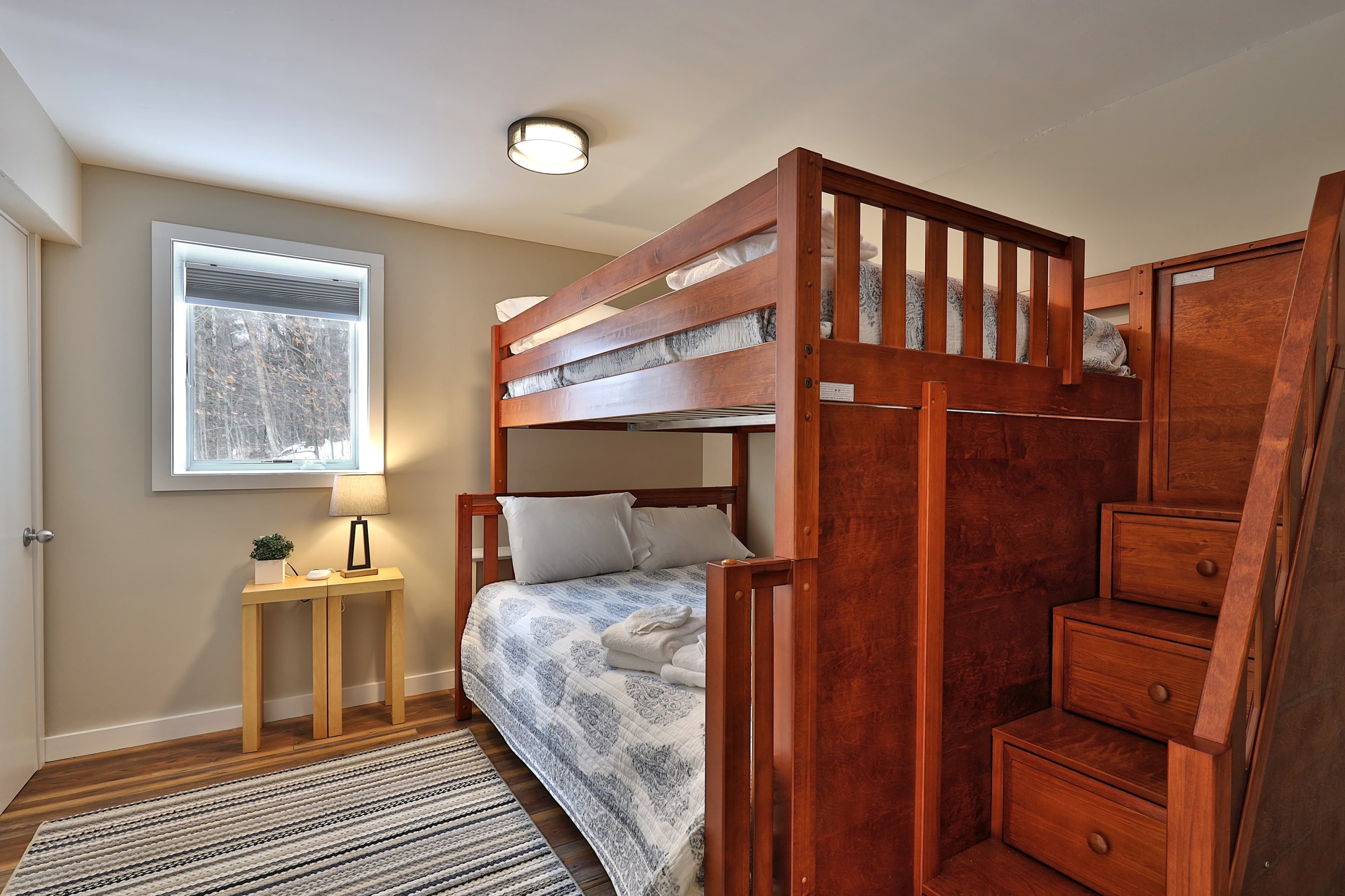 Beautiful bunk bed room. Top bunk (full size) Bottom bunk (queen size)