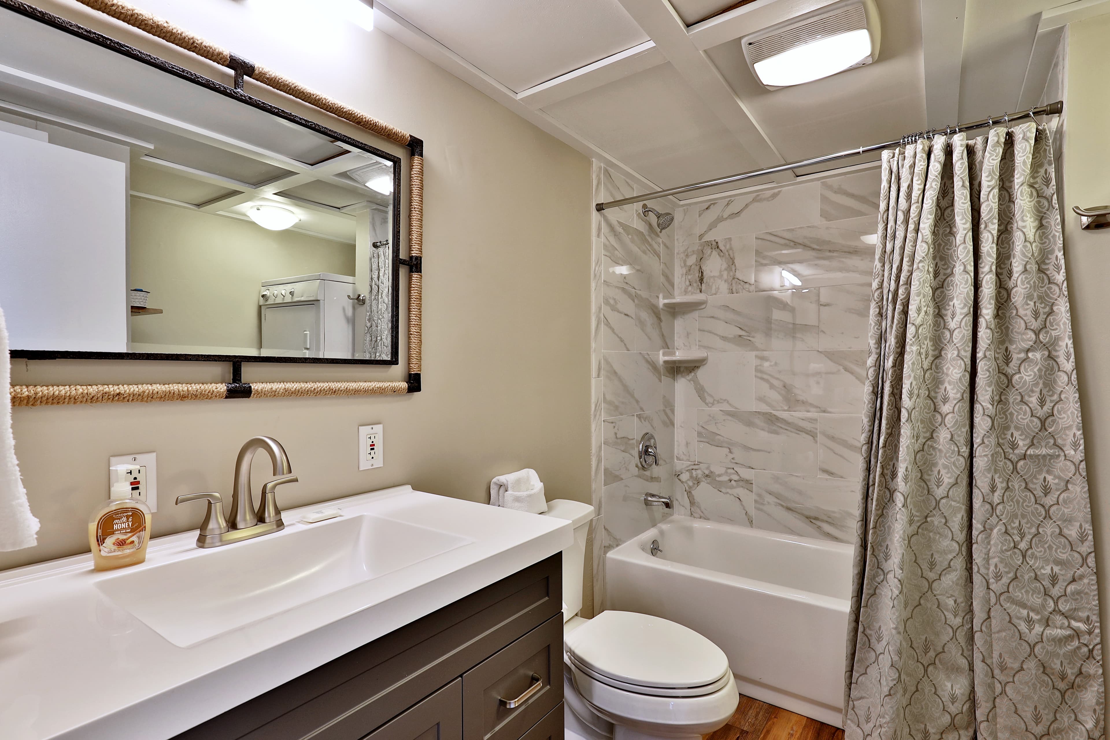 Shower/tub combo on the main floor living area.