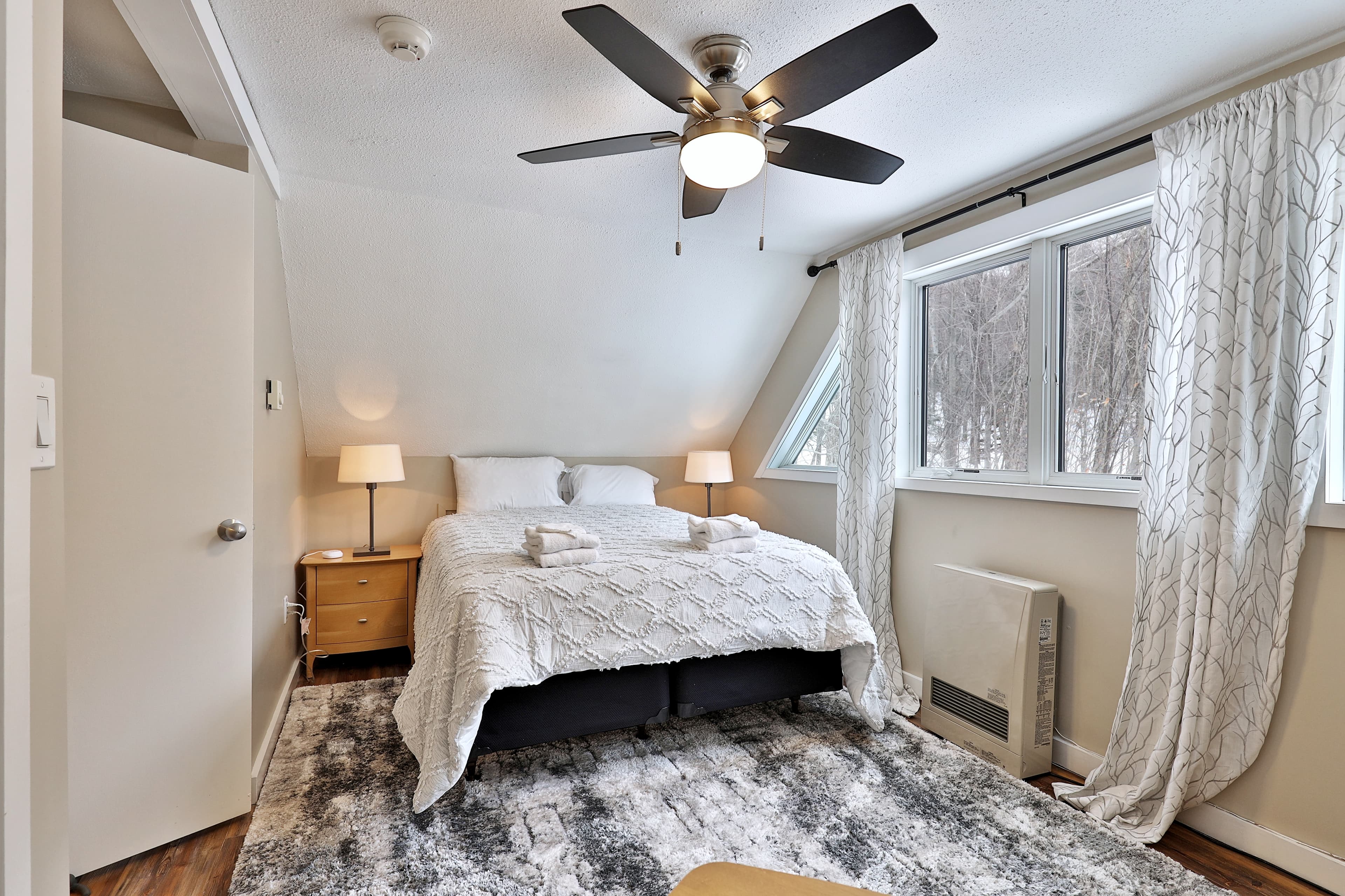 Beautifully decorated and snug bedroom with queen bed to help you have a restful