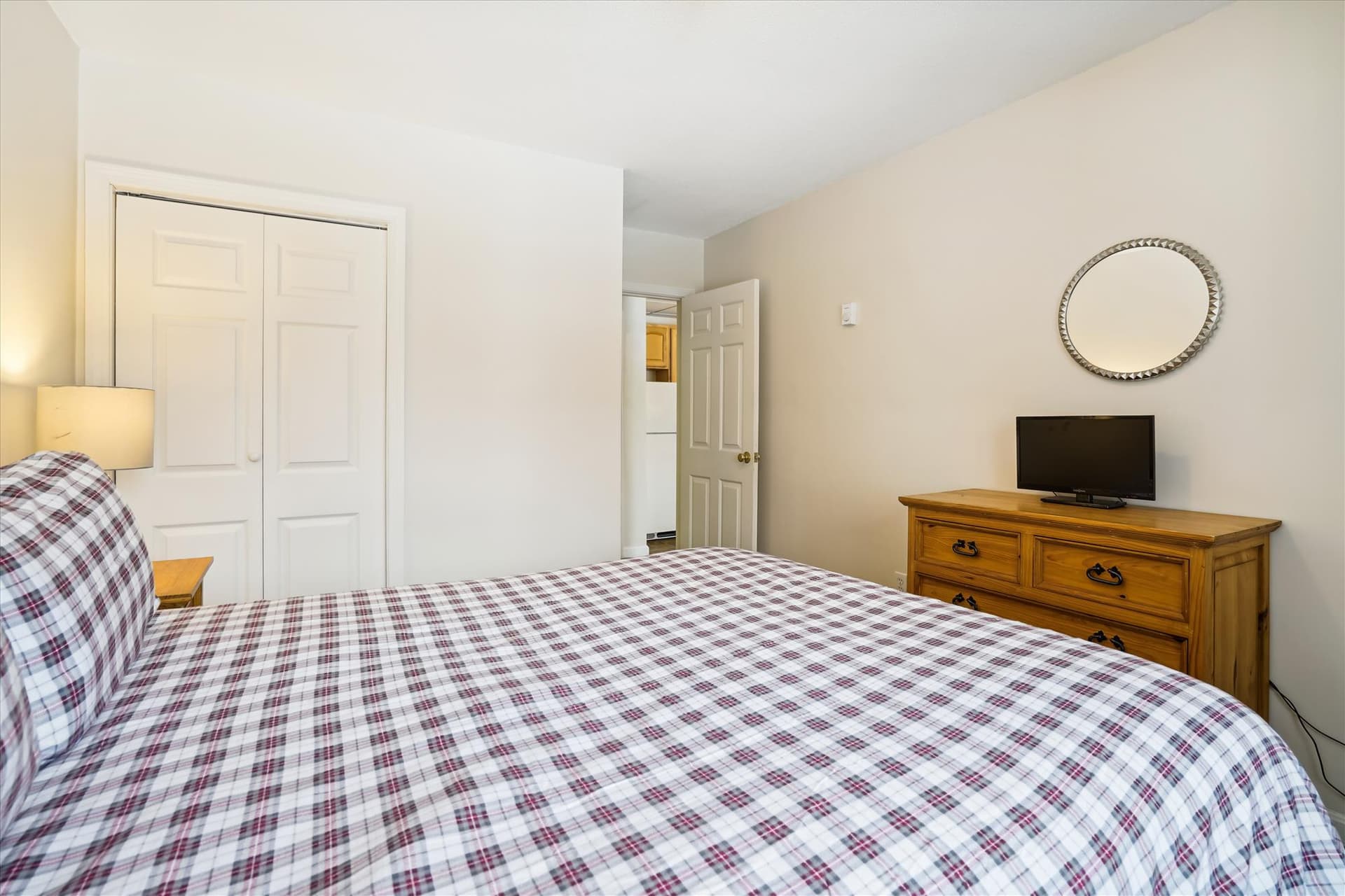 Watch the flat screen tv, while lying in bed.