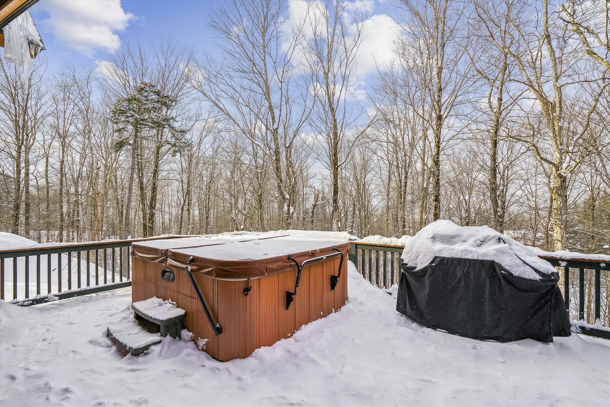 Relax in the hot tub after a long day of skiing.