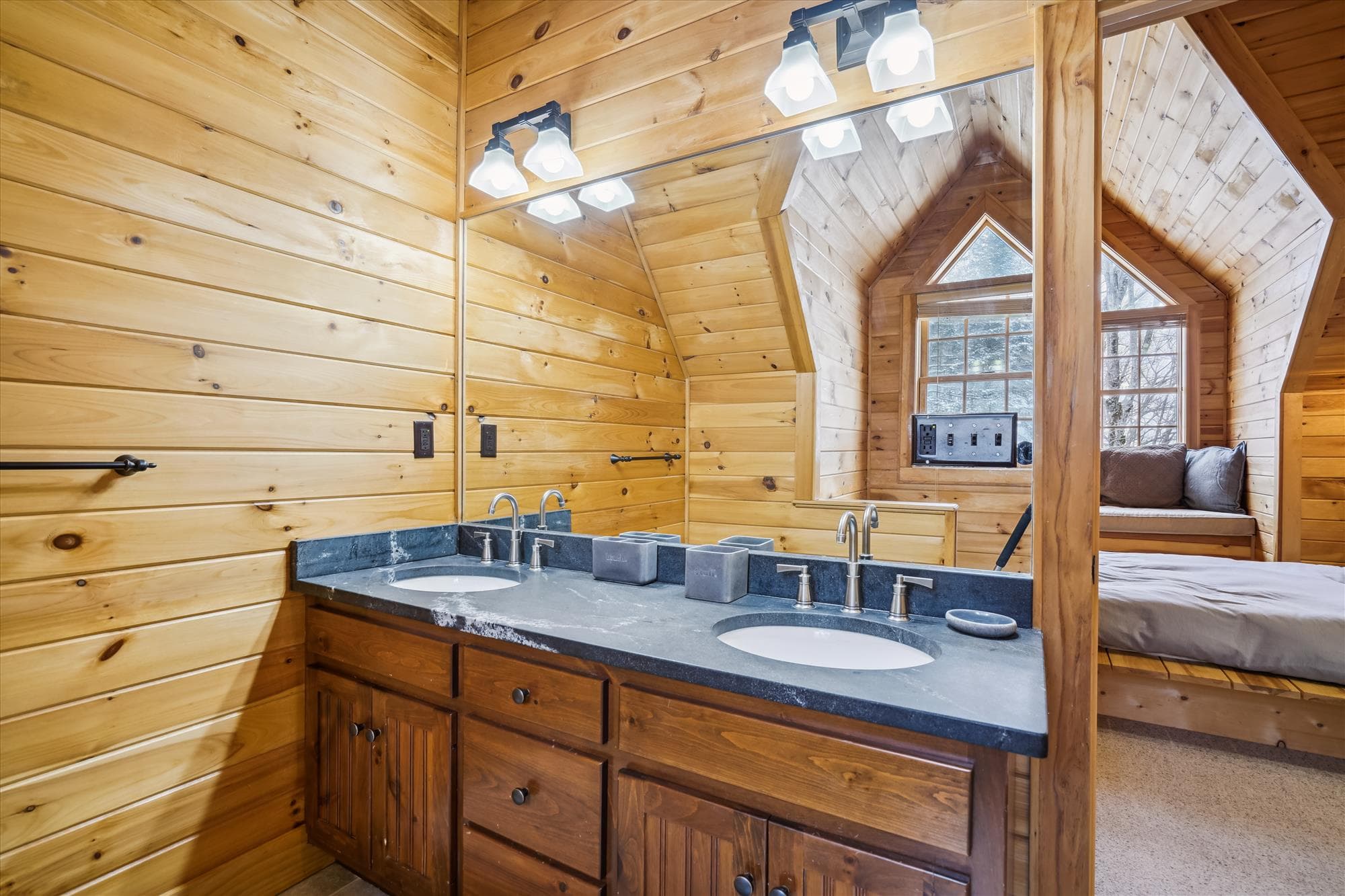 One of the four bathrooms. This one has double sinks for space and functionality.