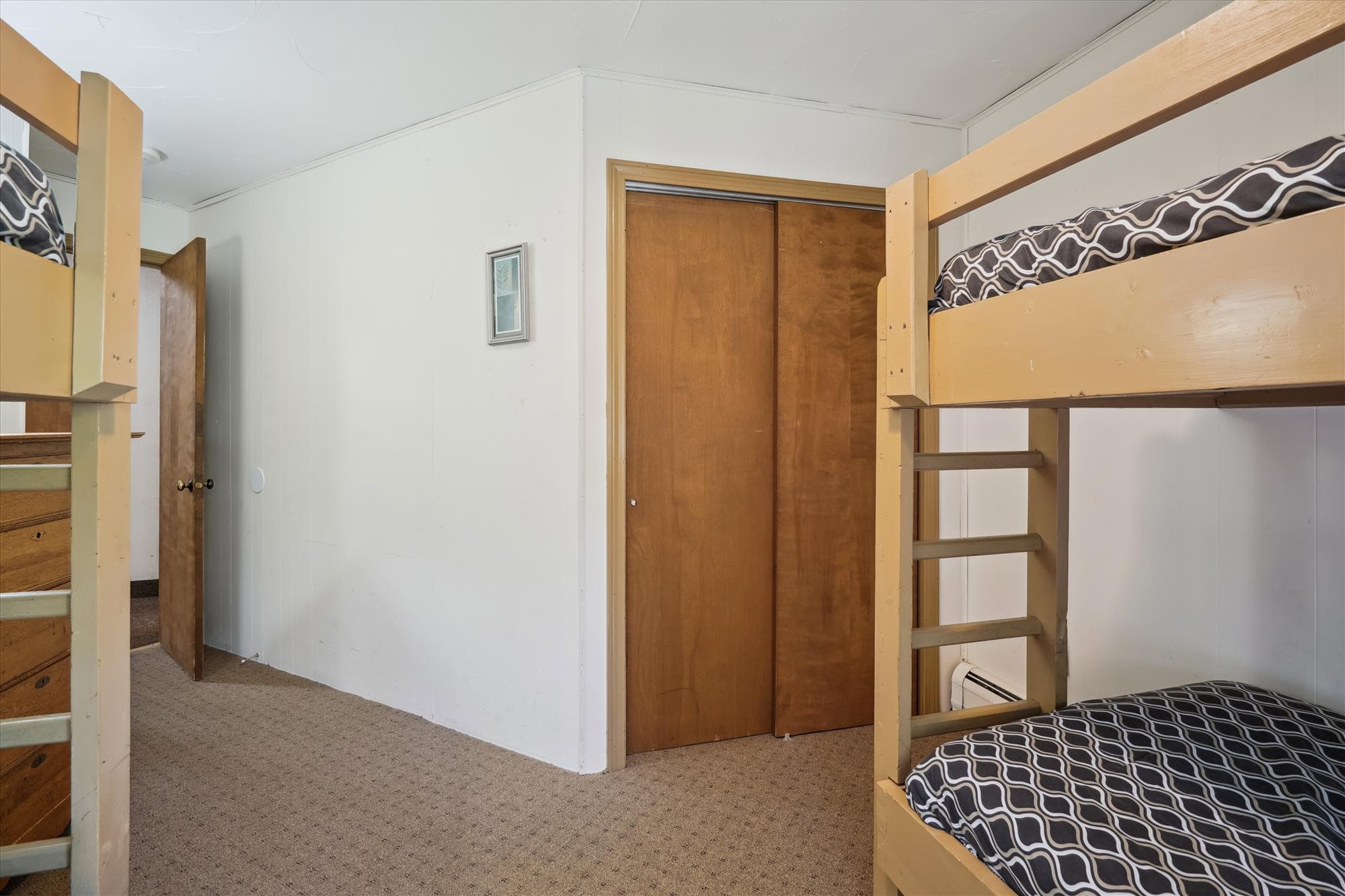 This bedroom offers a big closet to store your clothes.