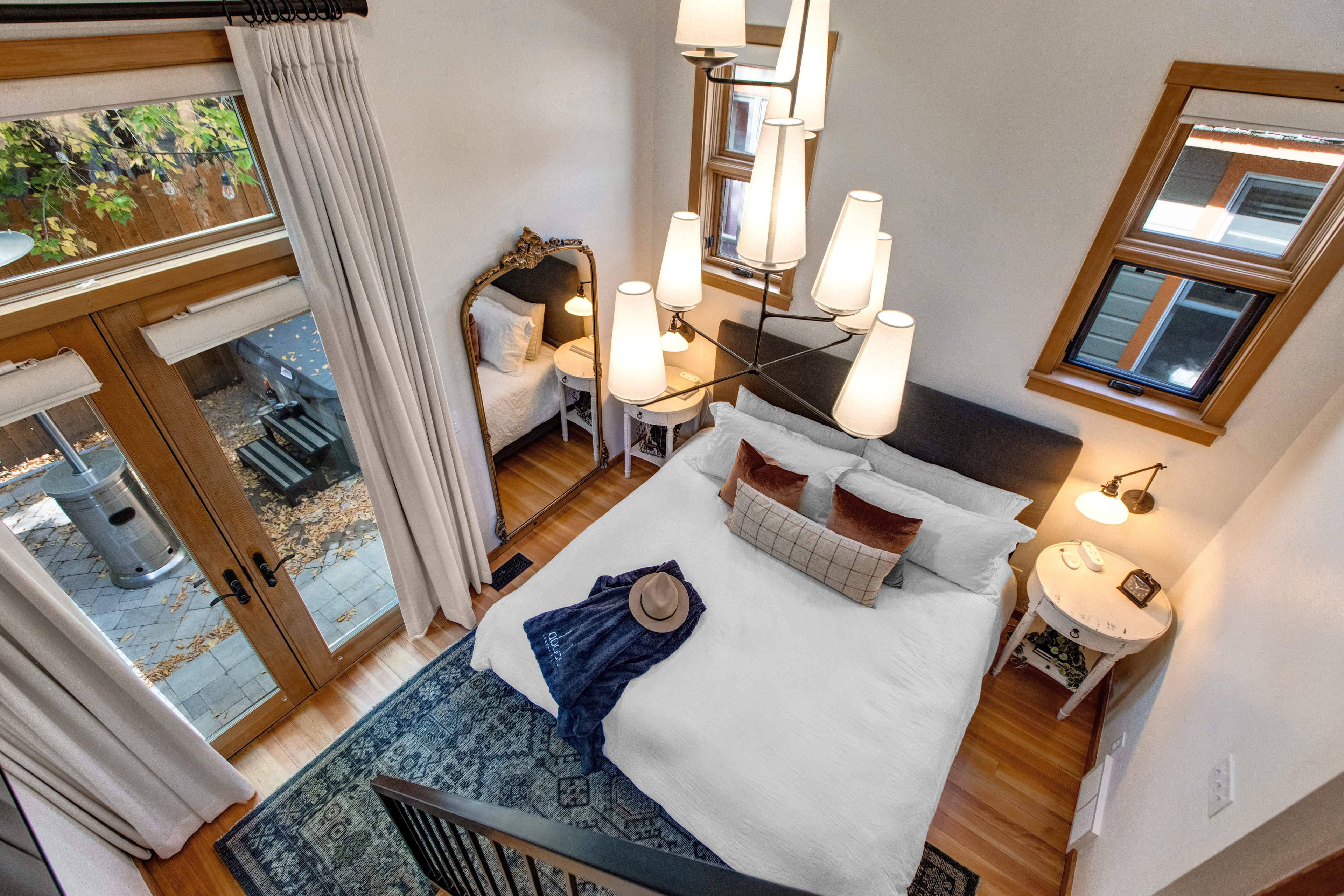 Master king bedroom, with ensuite bathroom and vaulted ceilings with a ladder up to an open loft with two additional twin beds.