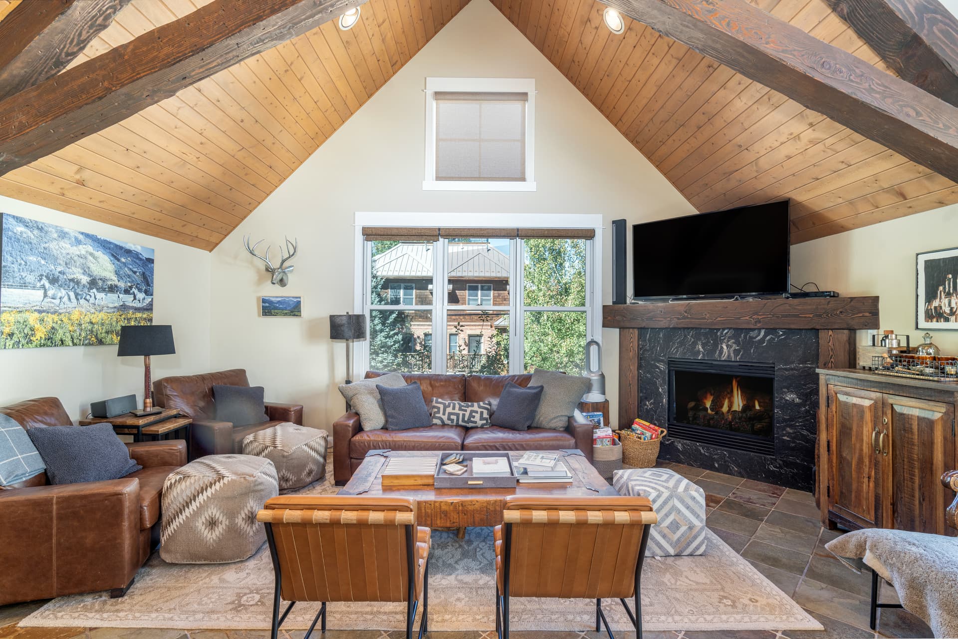 Such a cozy gathering spot in the great room with a fireplace.