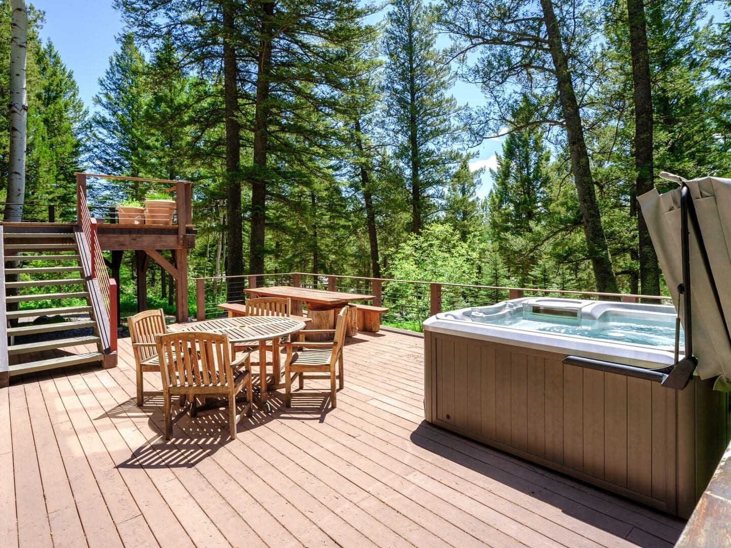 Lower Deck with Hot Tub and Dining Table