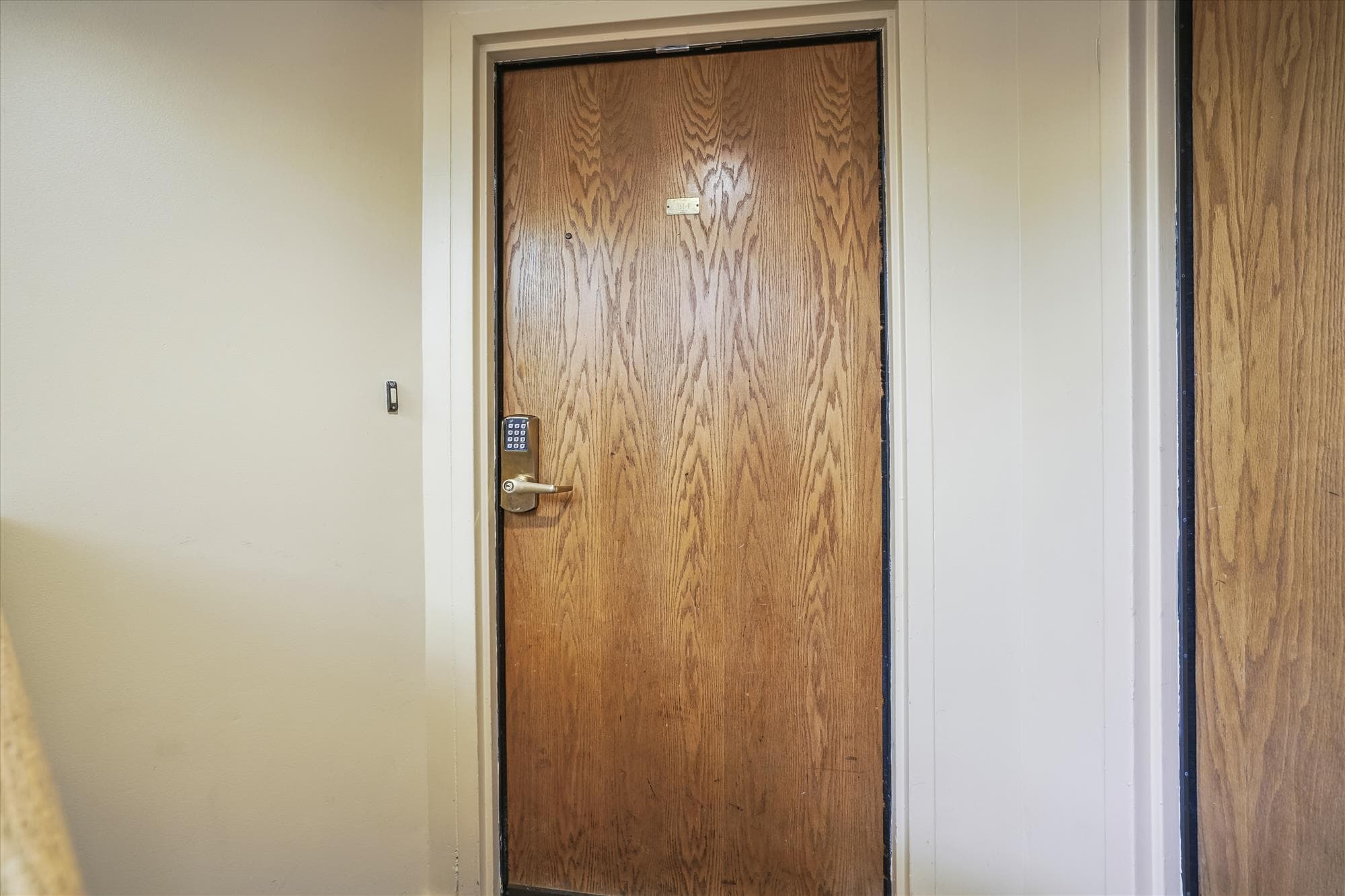 Private exterior entrance with secure keypad access for easy self check-in.