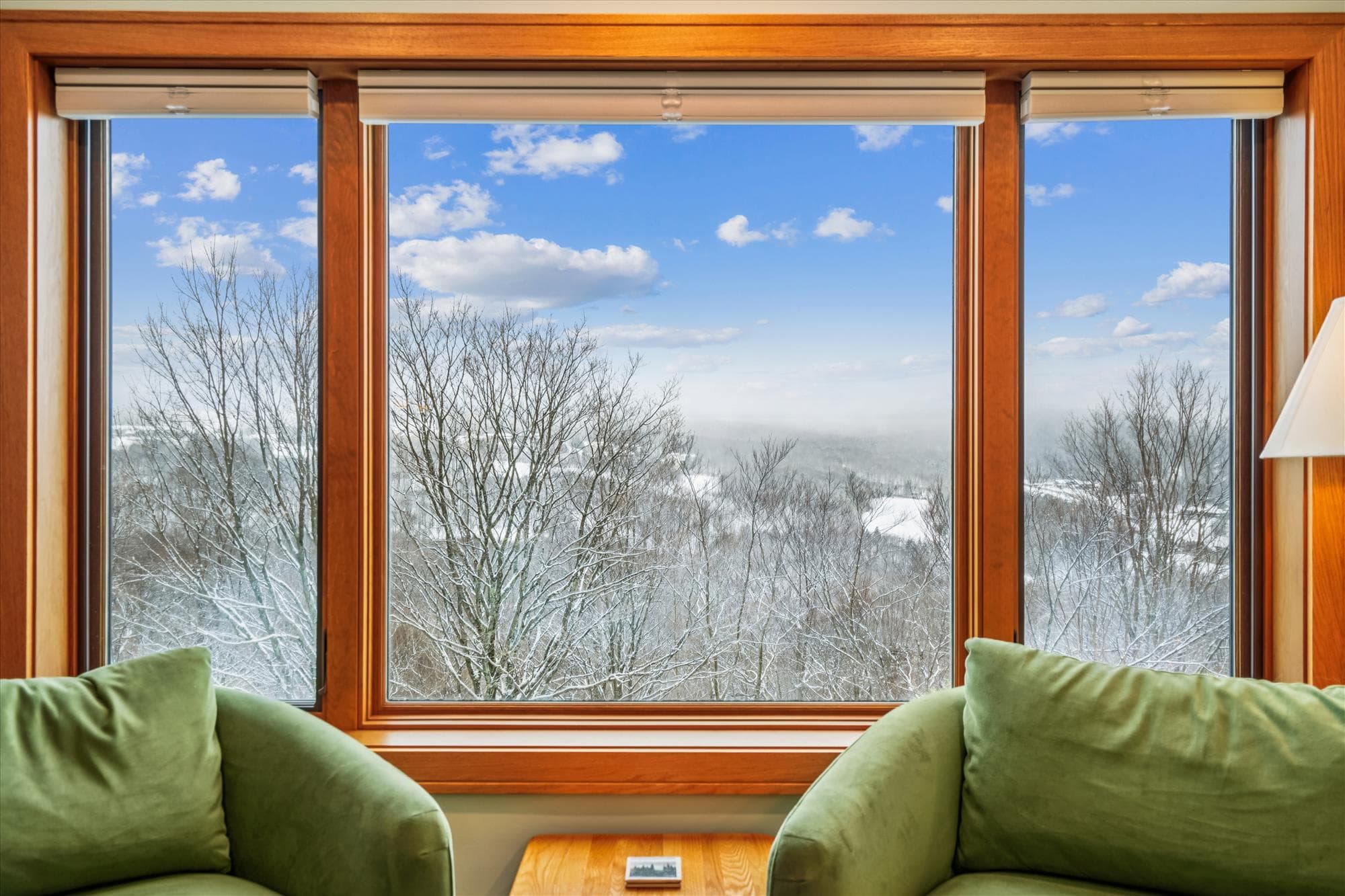 Take in sweeping mountain views right from the comfort of the living room through large picture windows overlooking the surrounding landscape.