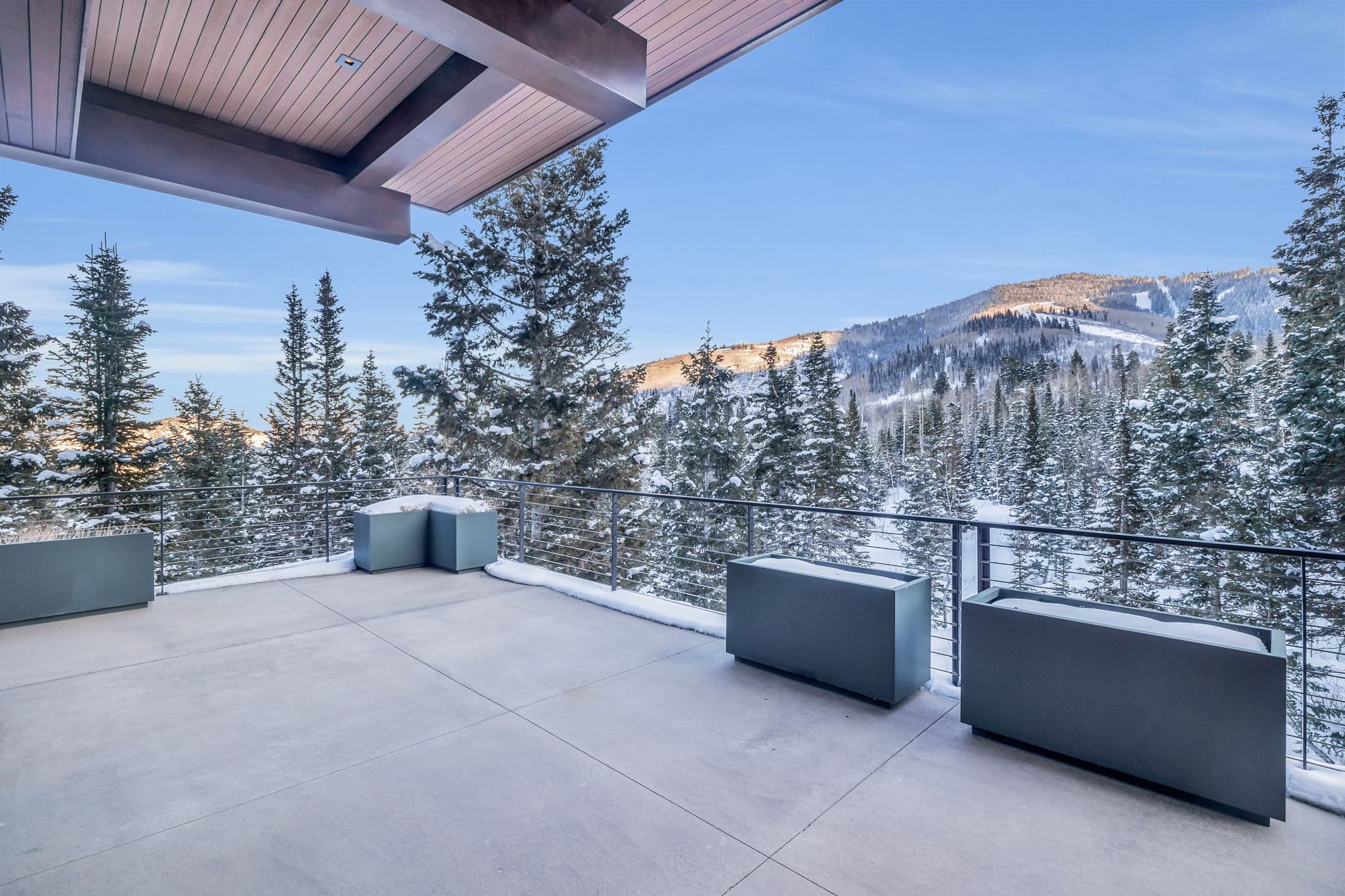 A breathtaking  balcony with panoramic mountain views.