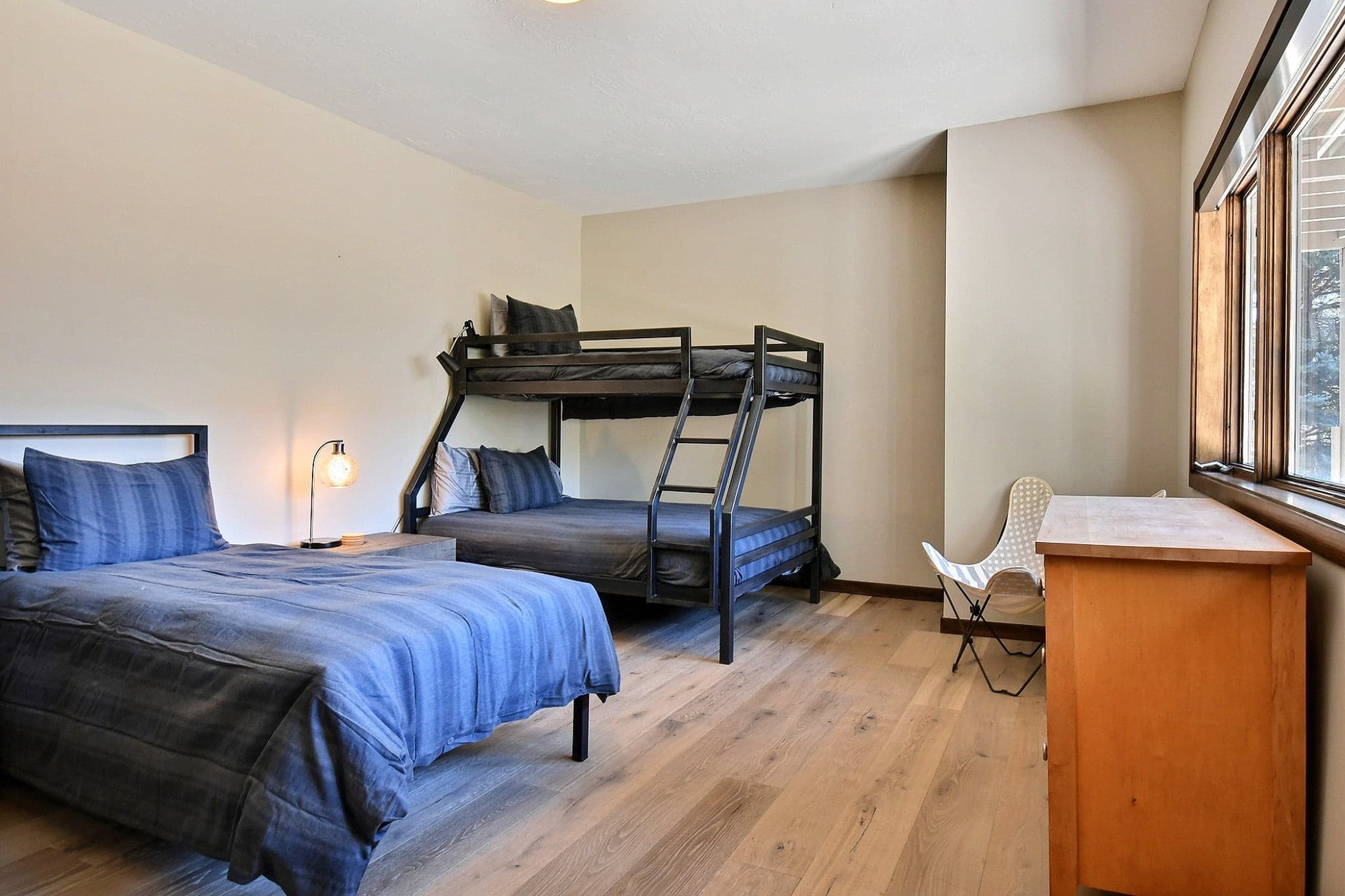 Bedroom Featuring a Full and Bunk Bed.