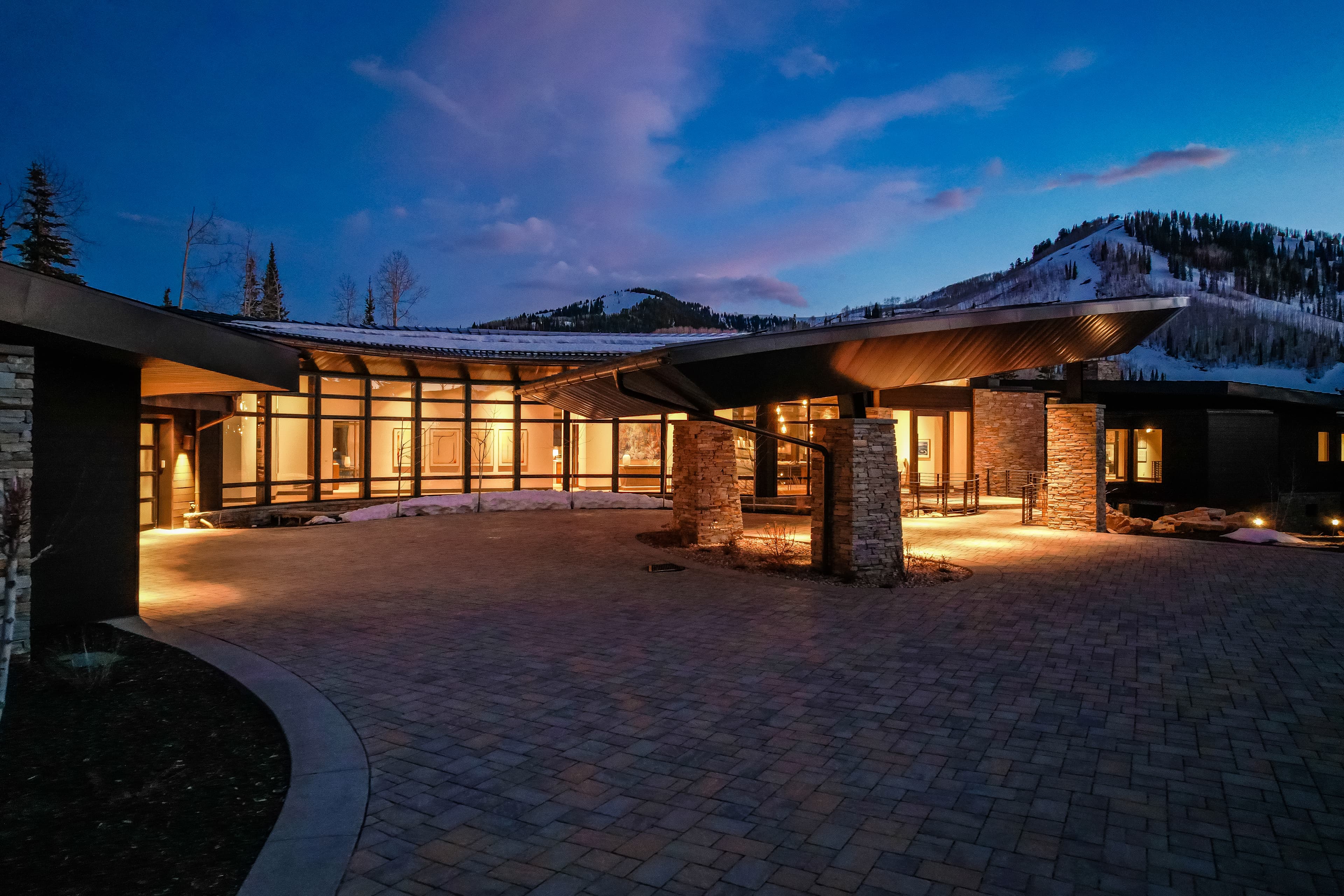 An exterior night view of our Alpine Opus at the Colony rental.