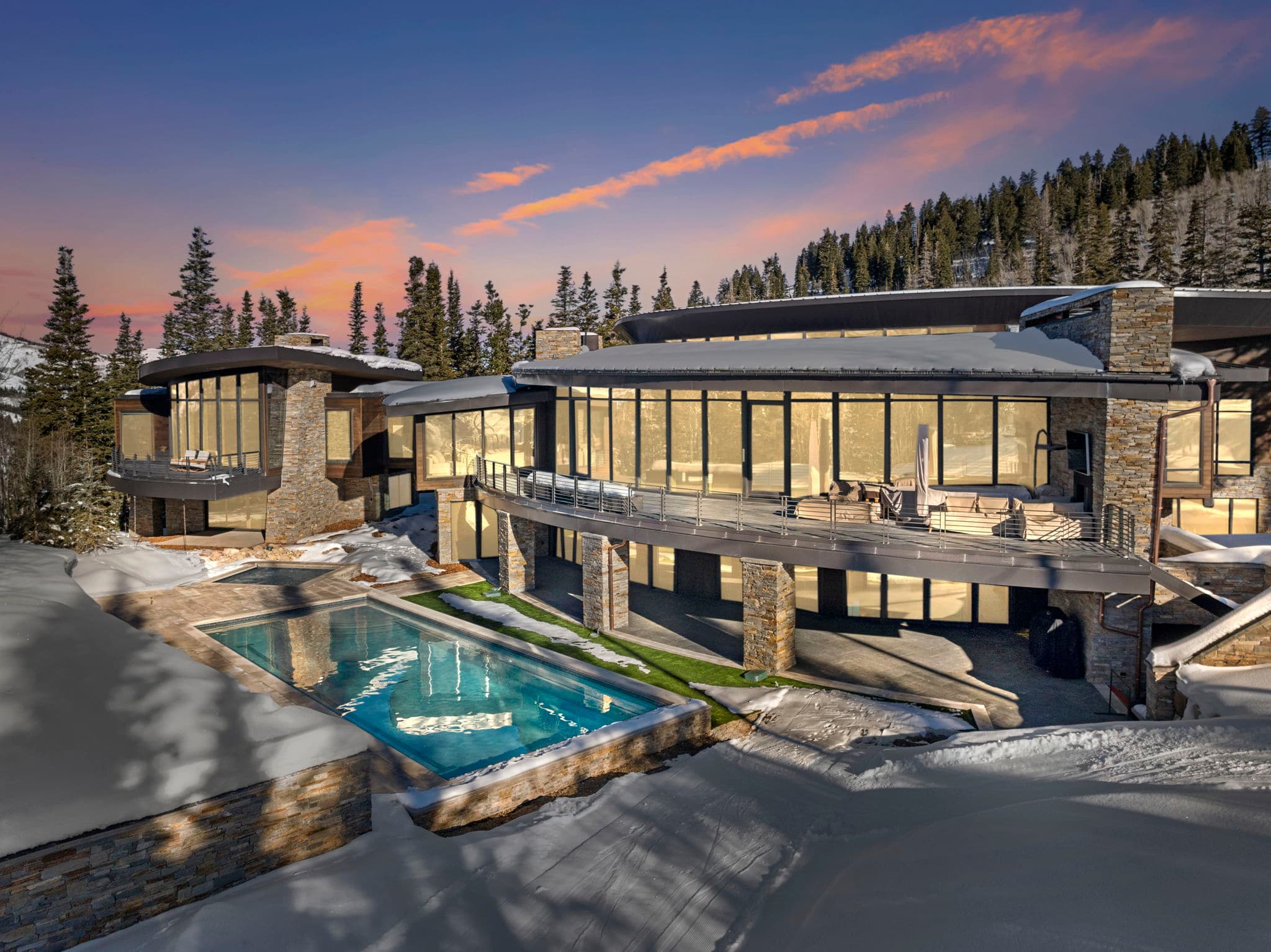 Exterior pool view of our Alpine Opus at the Colony luxury Park City Vacation rental.