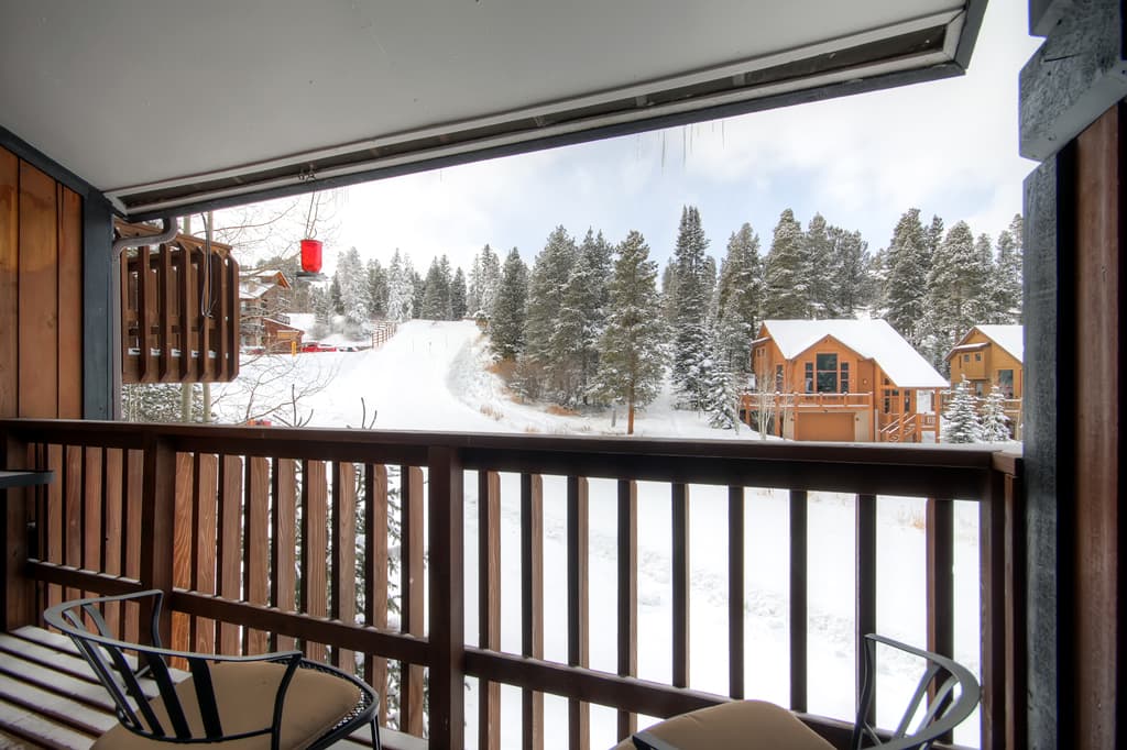 Watch skiers on the slopes from the private deck - 4 O'Clock Lodge D26 Breckenridge Vacation Rental