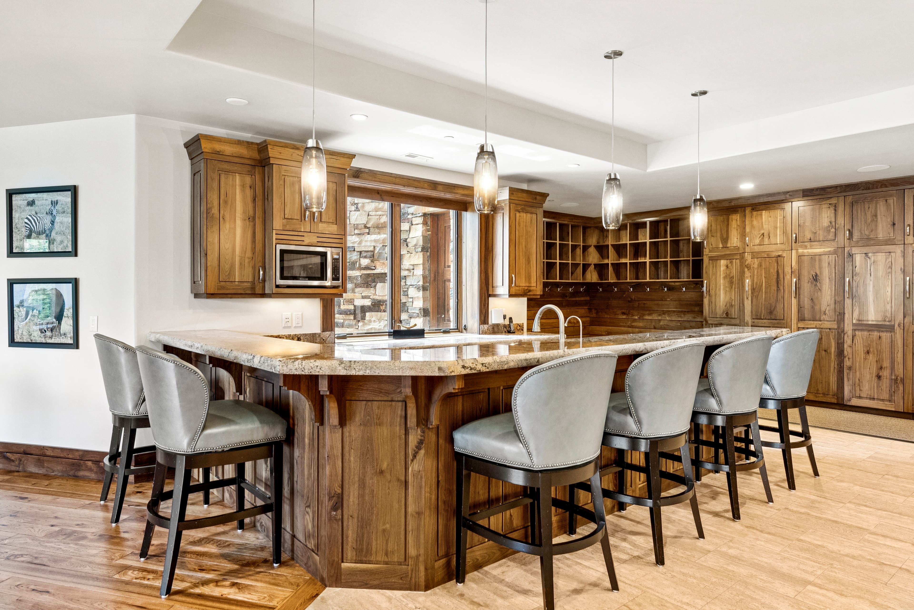 bar in game room with kitchen