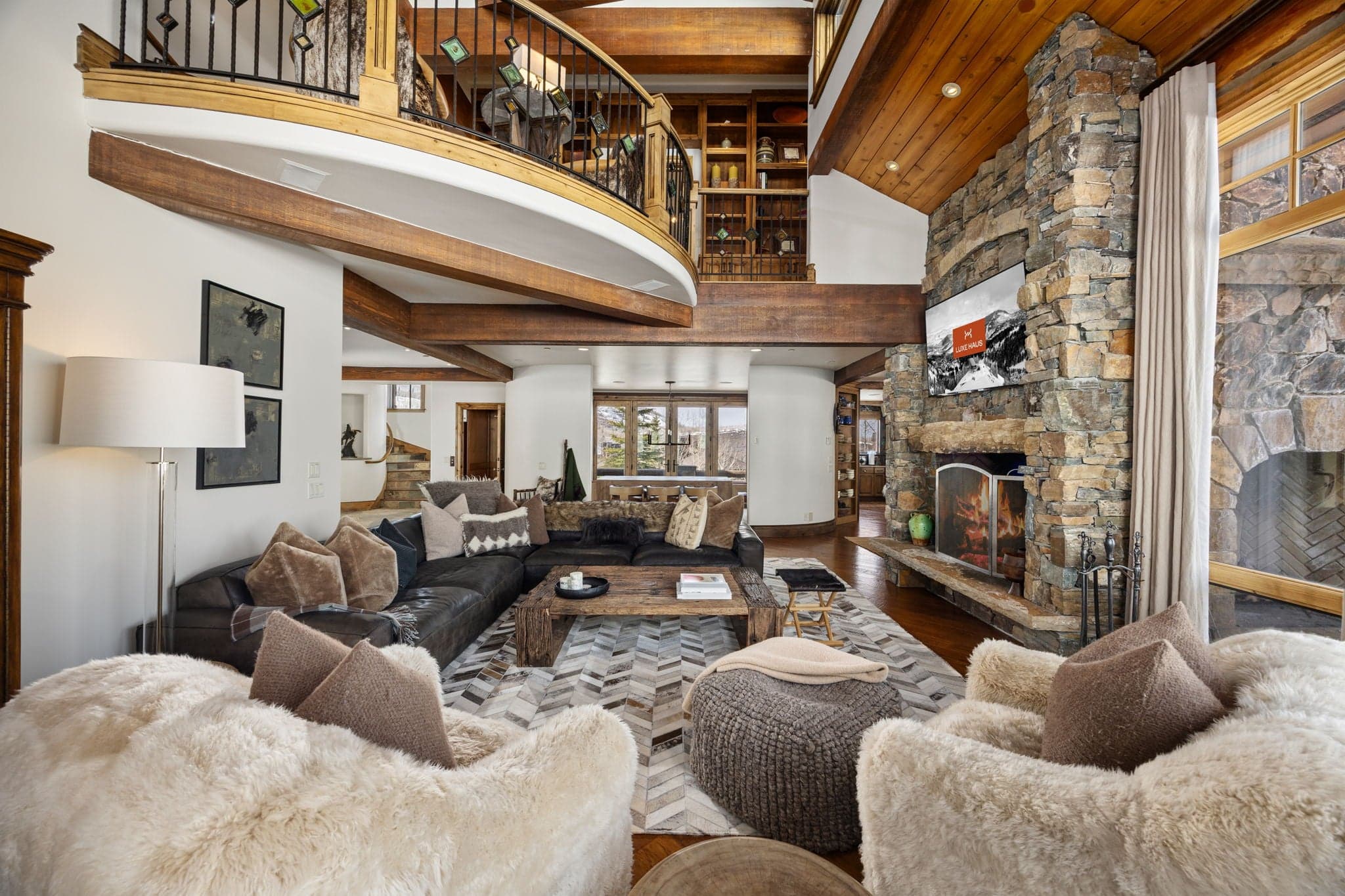 a view of the living room and second floor balcony
