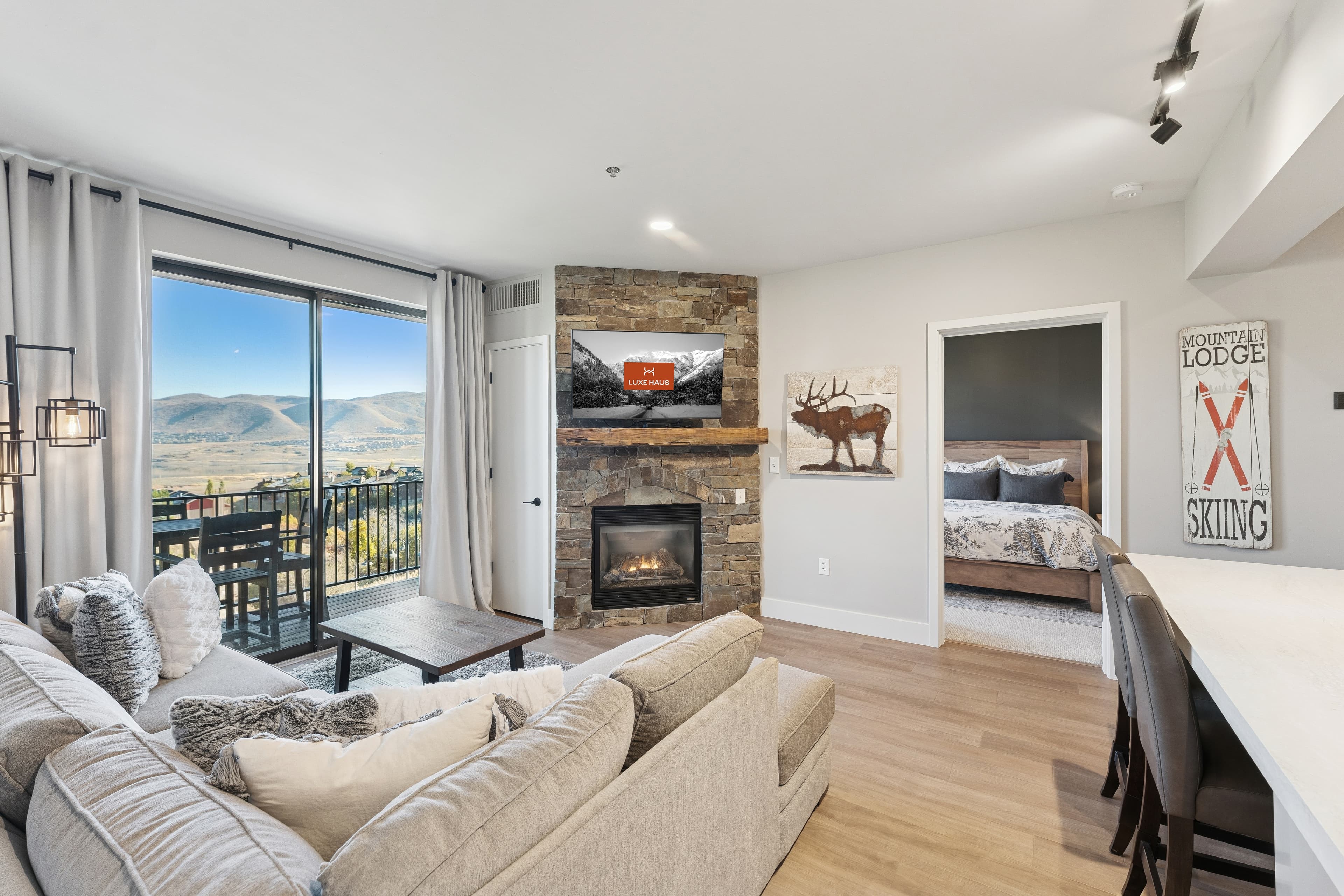 A view of the wasatch mountains from the living room of The Mason 3026