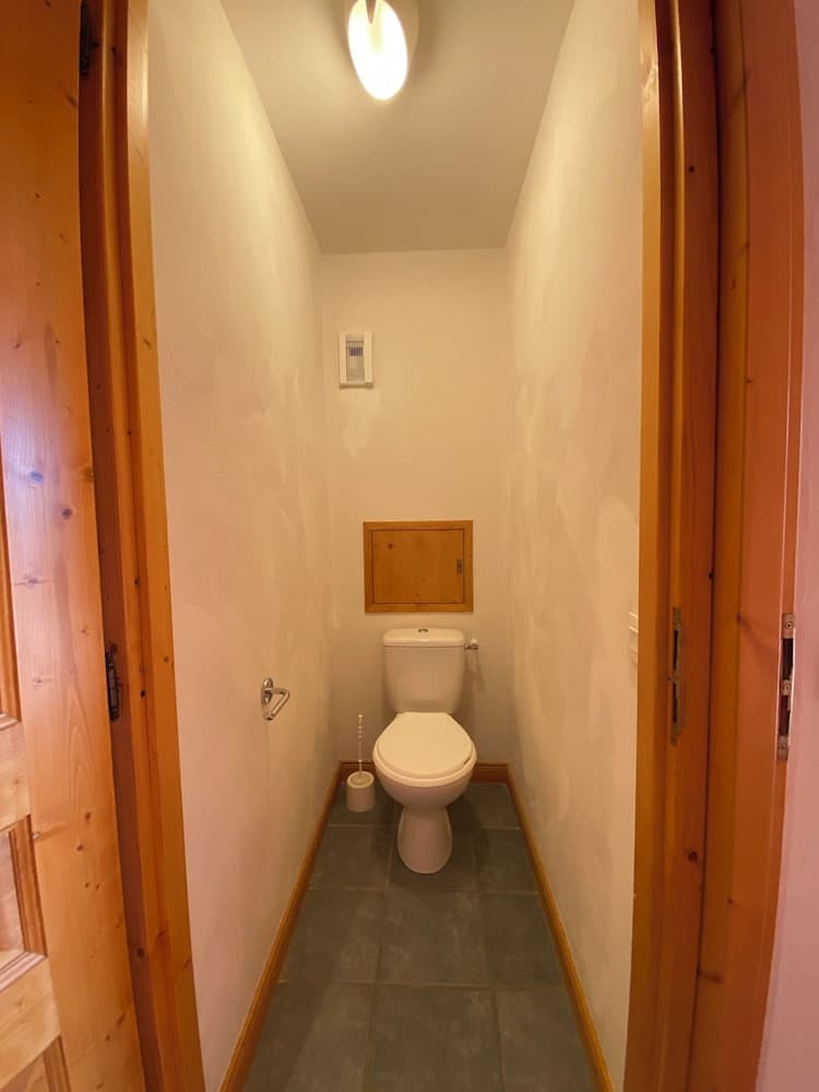 Raised toilet seat