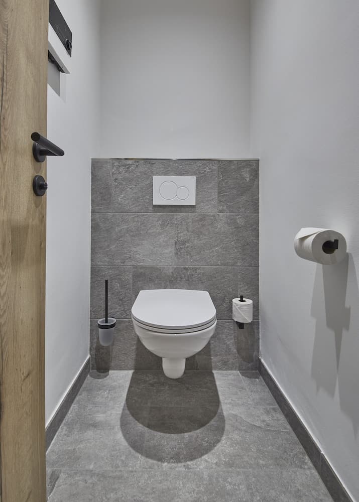 Raised toilet seat