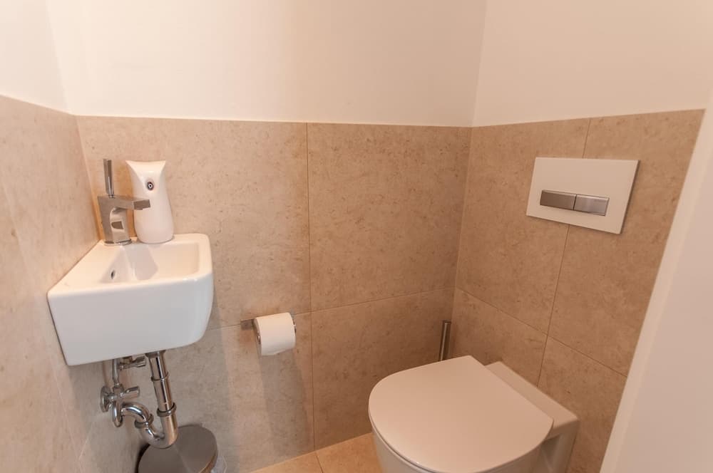 Raised toilet seat