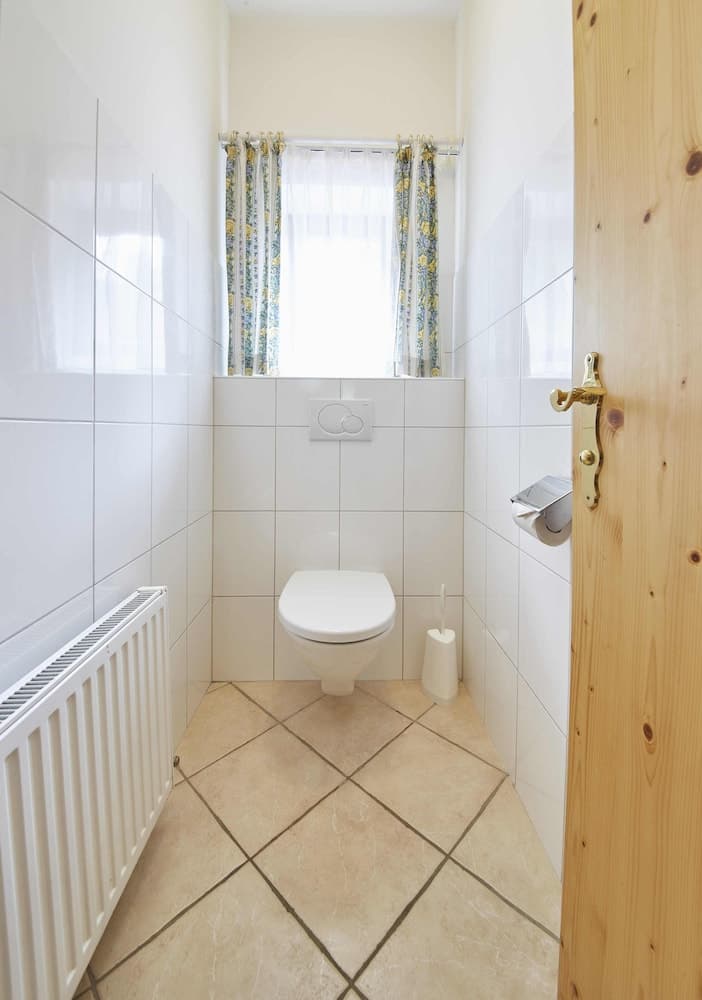 Raised toilet seat